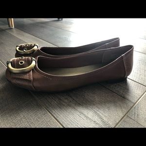 Brown flat with gold buckle